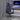 Scaun de gaming cu suport picioare, negru/albastru, piele eco