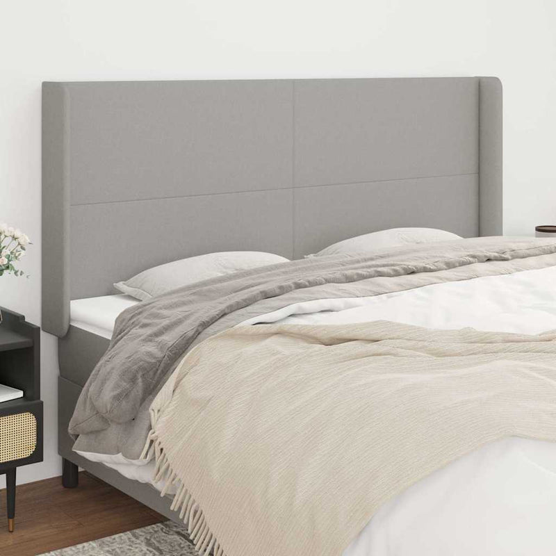 Tăblie de pat cu aripioare gri deschis 203x16x118/128 cm textil