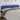 Tăblie de pat cu LED, albastru, 200x5x78/88 cm, textil