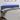 Tăblie de pat cu LED, albastru, 160x5x78/88 cm, textil