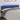 Tăblie de pat cu LED, albastru, 200x5x78/88 cm, textil