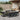 Set mobilier de exterior cu perne, 11 piese, negru, poliratan