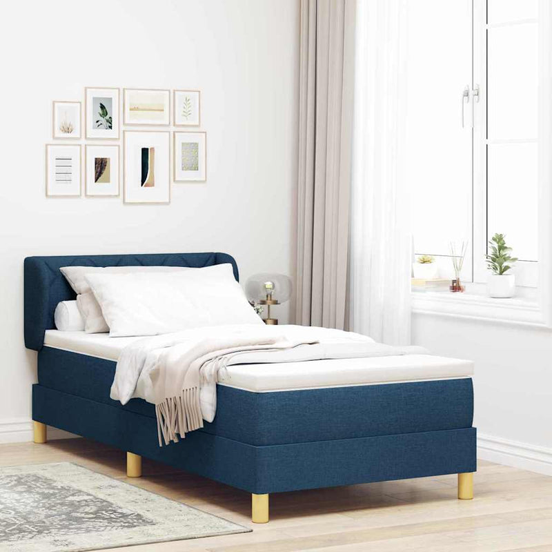 Pat cu arcuri cu headboard albastru 90 x 190 cm țesătură