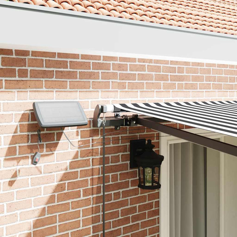 Copertină retractabilă manual cu LED, antracit/alb, 400x300 cm