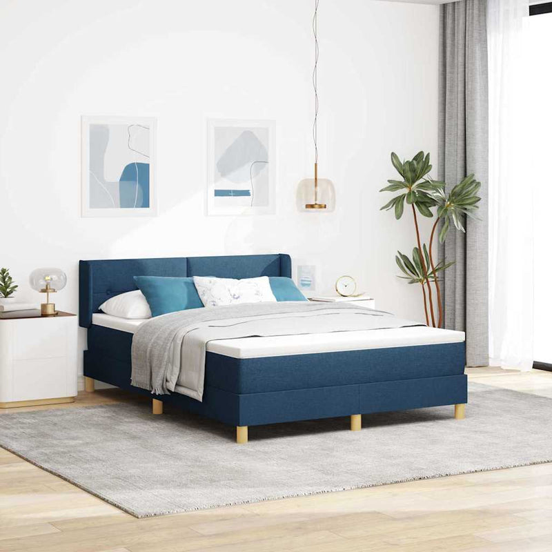 Pat cu arcuri cu headboard albastru 190 x 140 cm țesătură