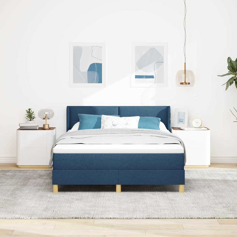 Pat cu arcuri cu headboard albastru 190 x 140 cm țesătură