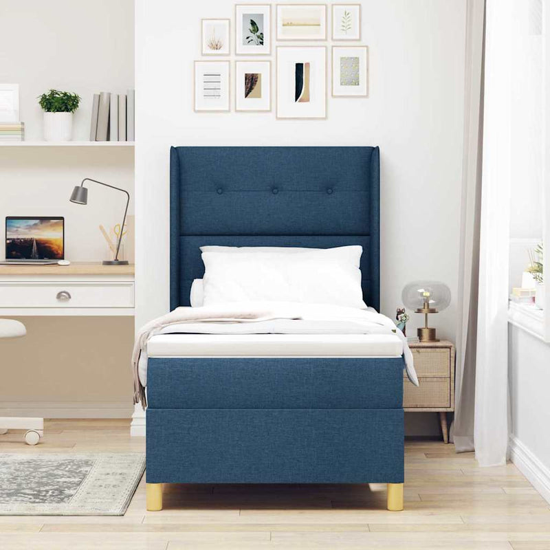 Pat cu arcuri cu headboard albastru 90 x 190 cm țesătură