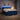 Pat box spring cu saltea și LED albastru 180 x 200 cm Țesătură